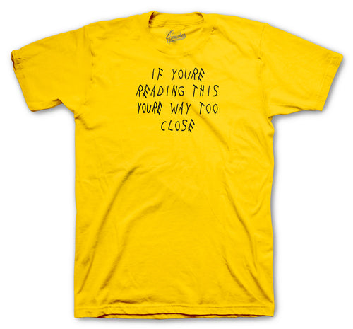 Gold tees to match the Jordan 12 university gold sneaker collection 