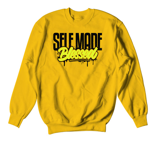 Volt Gold Jordan 1 sneaker collection to match guys sweater collection 