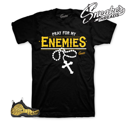 Metallic gold foamposite shirts match foam sneaker tees shirts.