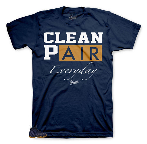 Foamposite Midnight Navy sneakers has matching shirt designed to match shoe Foamposite
