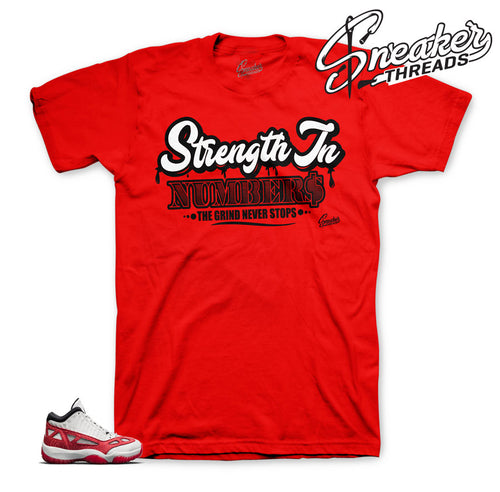 The best shirts to match Jordan 11 fire red IE sneakers.