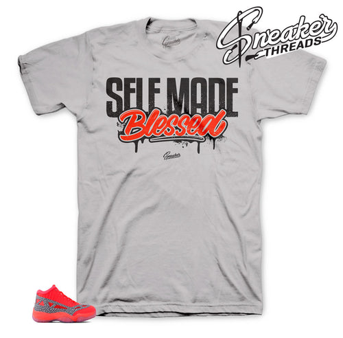Flash crimson Jordan 11 sneaker tees match retro 11 crimson shoes.