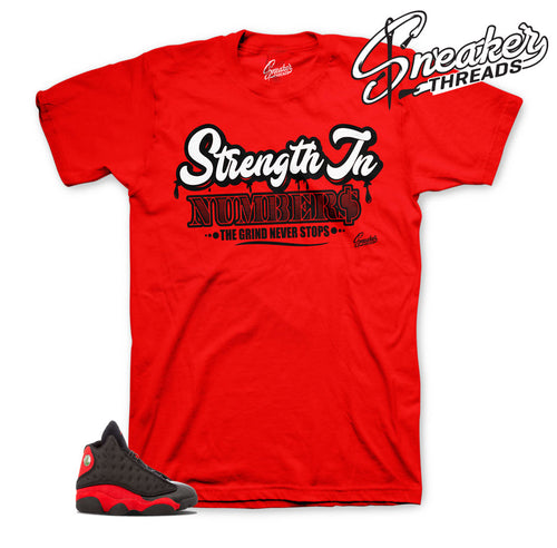 Shirts match Jordan 13 bred | strength in numbers tee