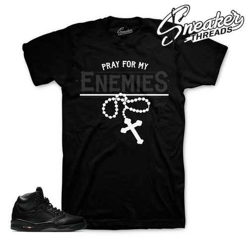 Triple black Jordan 5 shirt match pinnacle 5's shoes.