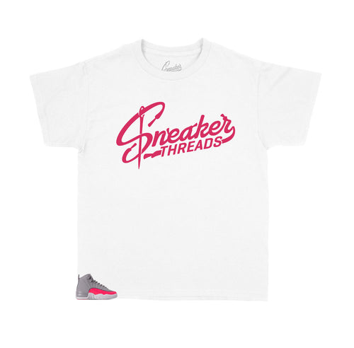 Jordan 12 kids racer pink sneakers have kids shirts designed to match with the Jordan 12 racer pink sneakers