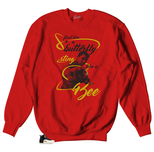 Jordan 12s Chinese New Tear sneaker matches sweater designed perfectly to match Jordan 12 cny sneaker