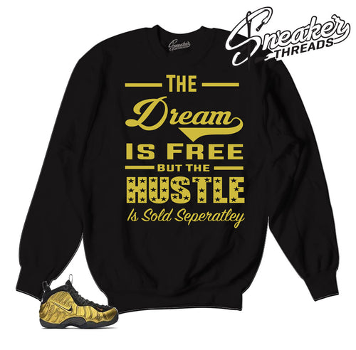 Store carries shirts to match foamposite metallic gold shoes.